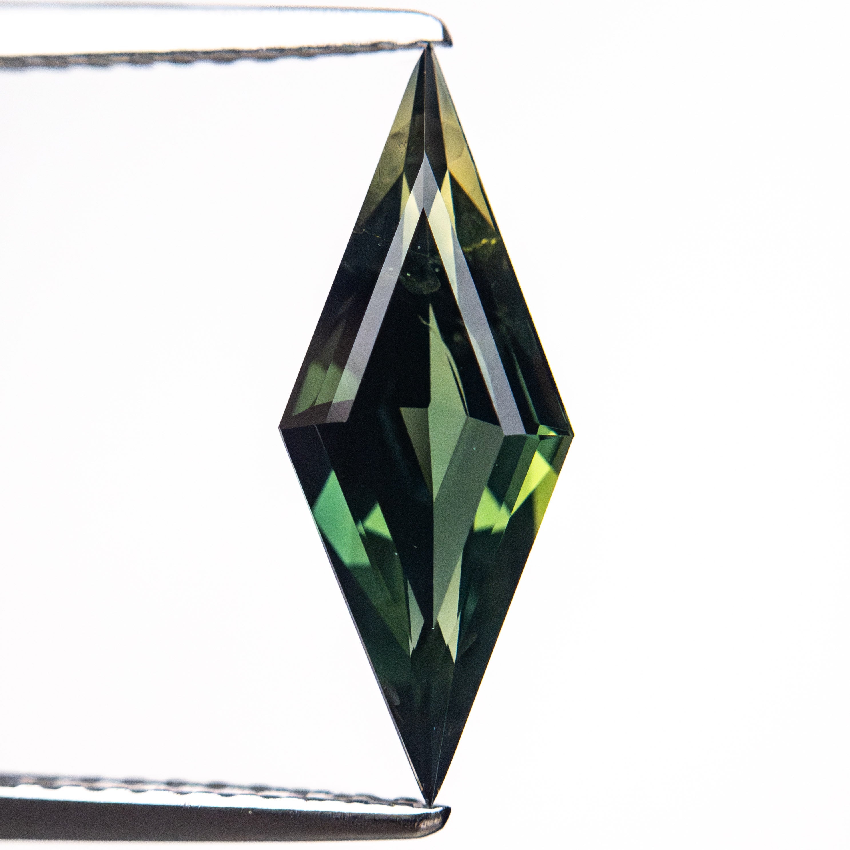 1.39ct 14.91x5.75x3.03mm Lozenge Step Cut Sapphire 25363-01