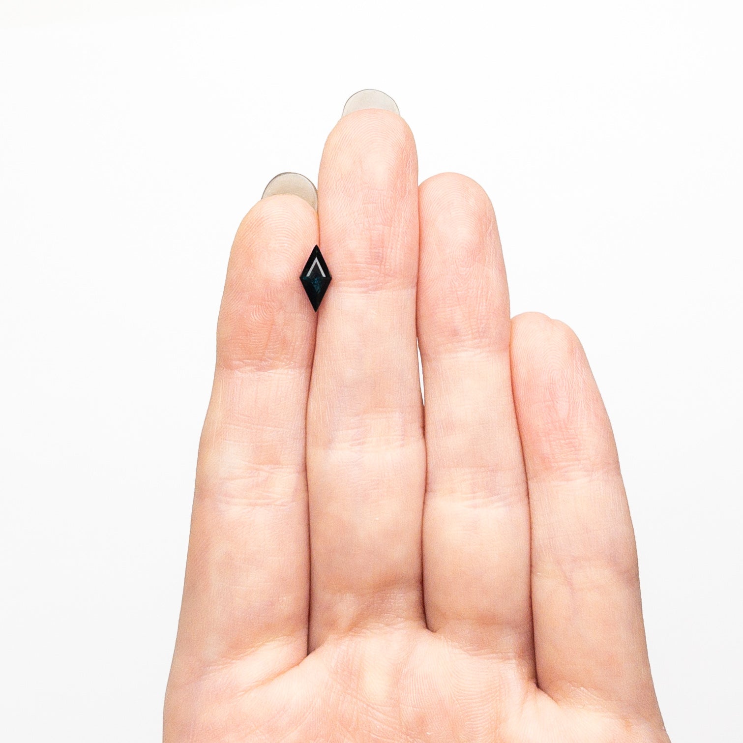 0.64ct 9.14x4.41x3.12mm Lozenge Step Cut Sapphire 25740-07