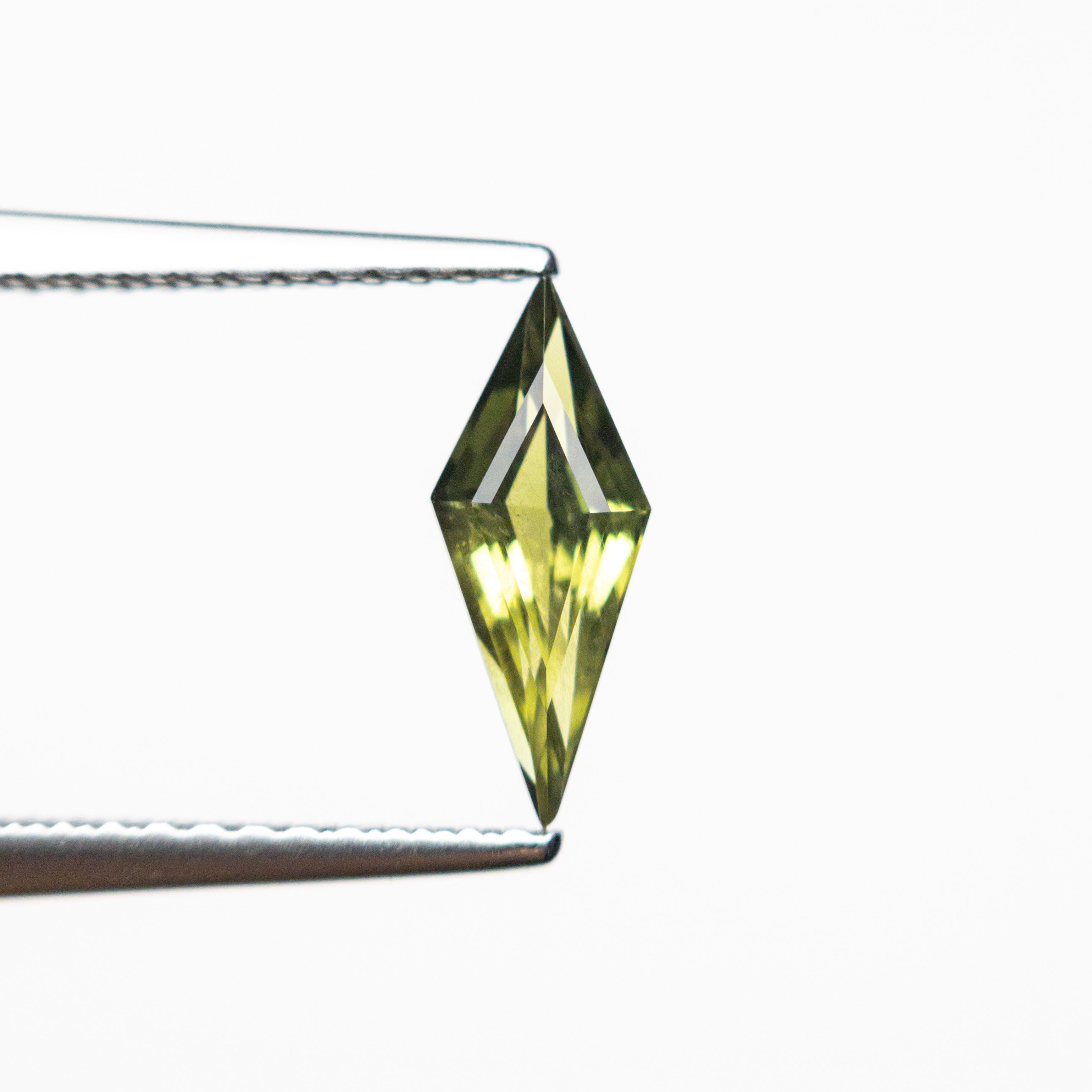 0.63ct 10.05x4.07x2.72mm Kite Step Cut Sapphire 25740-10
