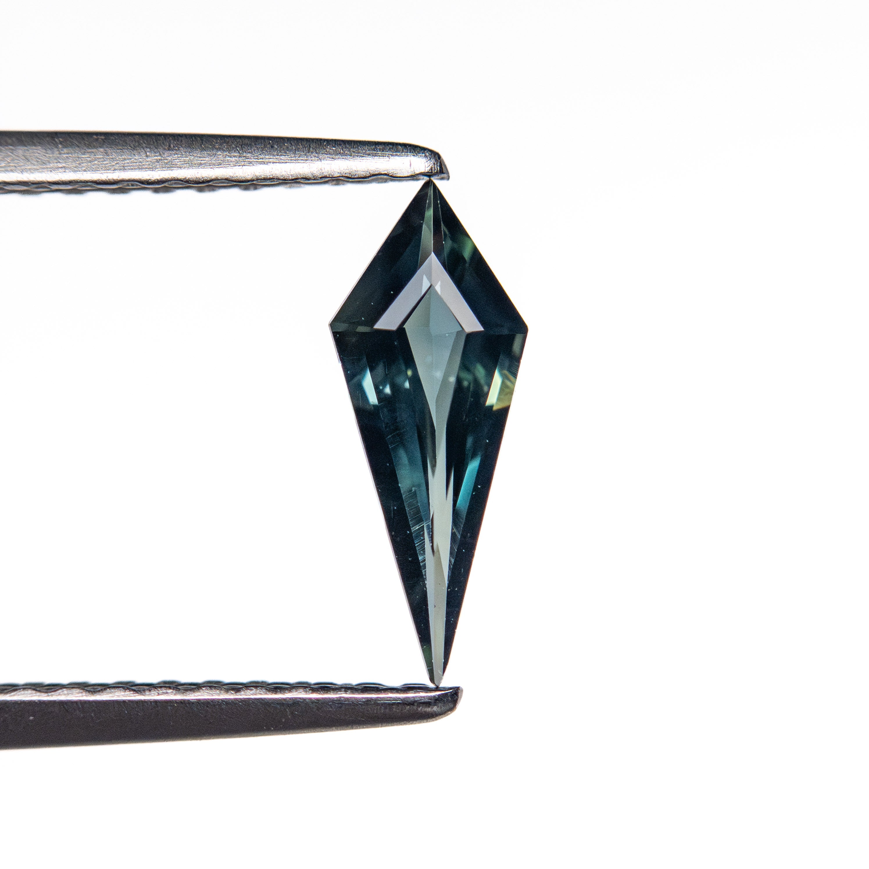 0.42ct 9.69x3.83x2.16mm Kite Step Cut Sapphire 25740-21