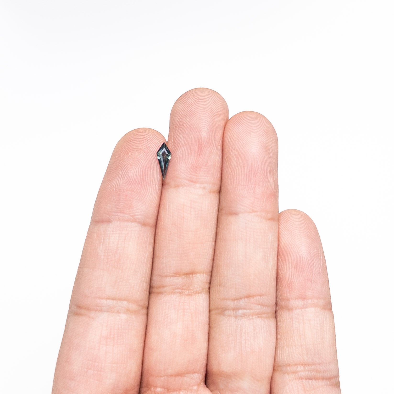 0.42ct 9.69x3.83x2.16mm Kite Step Cut Sapphire 25740-21