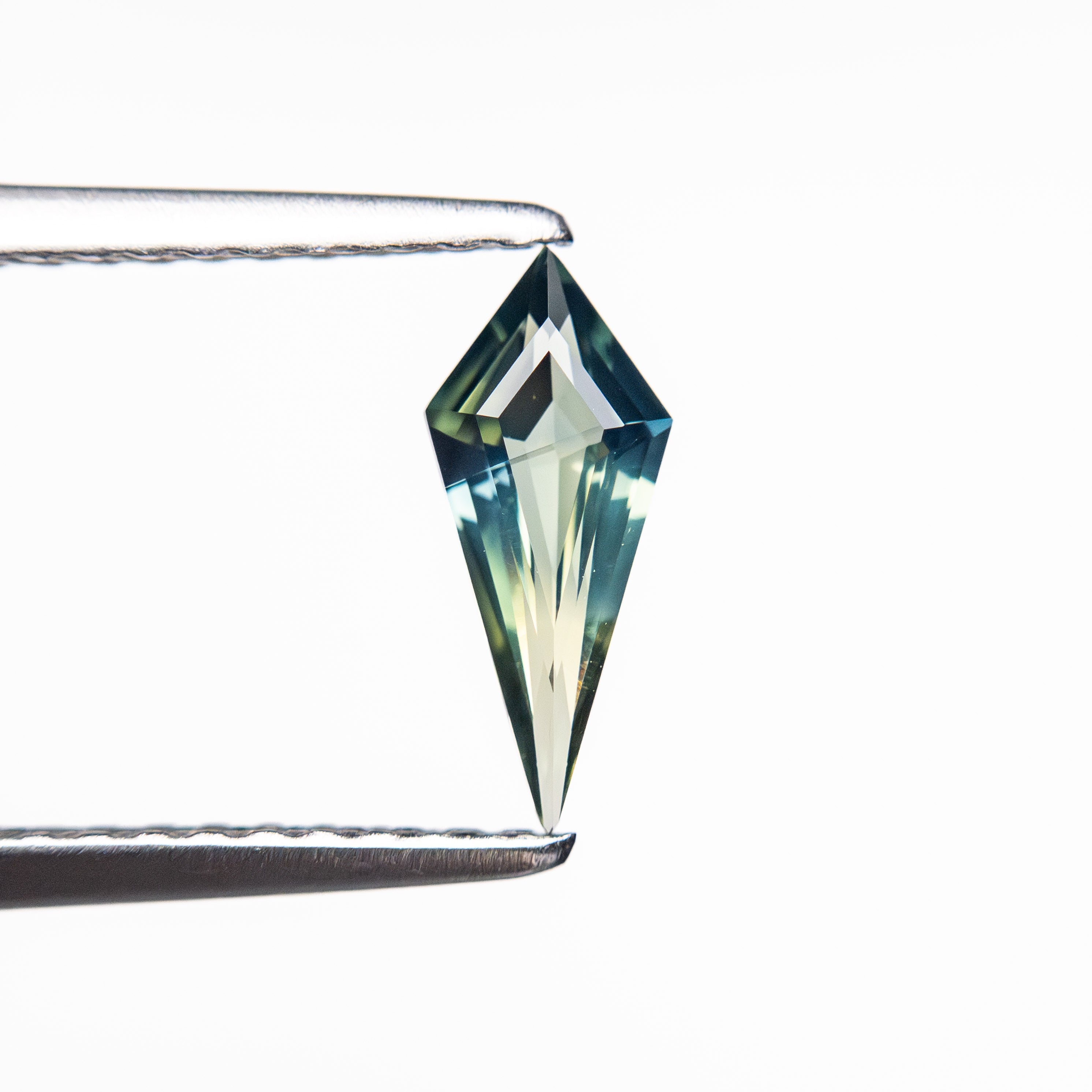 0.39ct 9.03x3.81x2.10mm Kite Step Cut Sapphire 25740-29