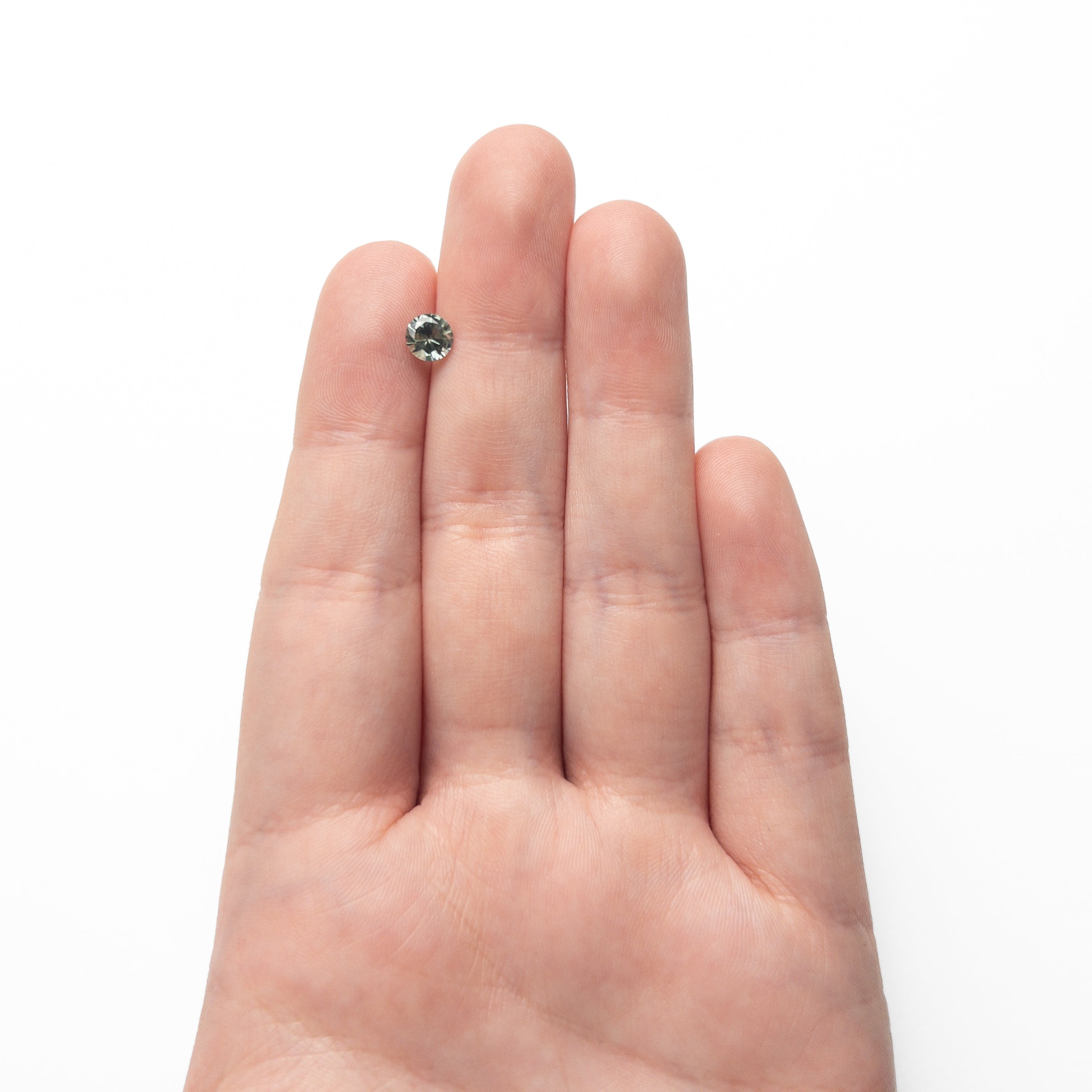 0.76ct 5.55x5.22x3.43mm Round Brilliant Sapphire 26134-03