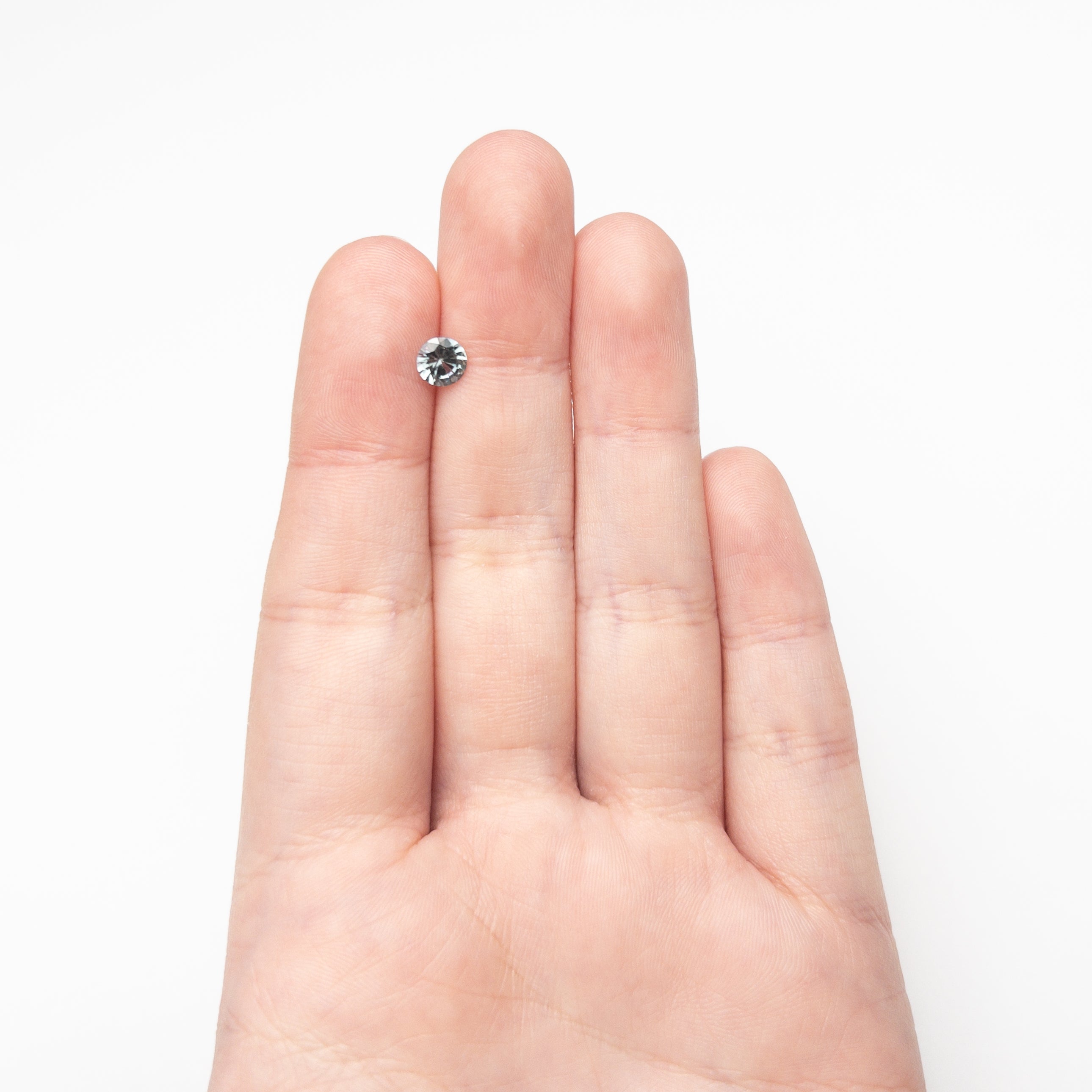 0.77ct 5.54x5.52x3.42mm Round Brilliant Sapphire 26134-07