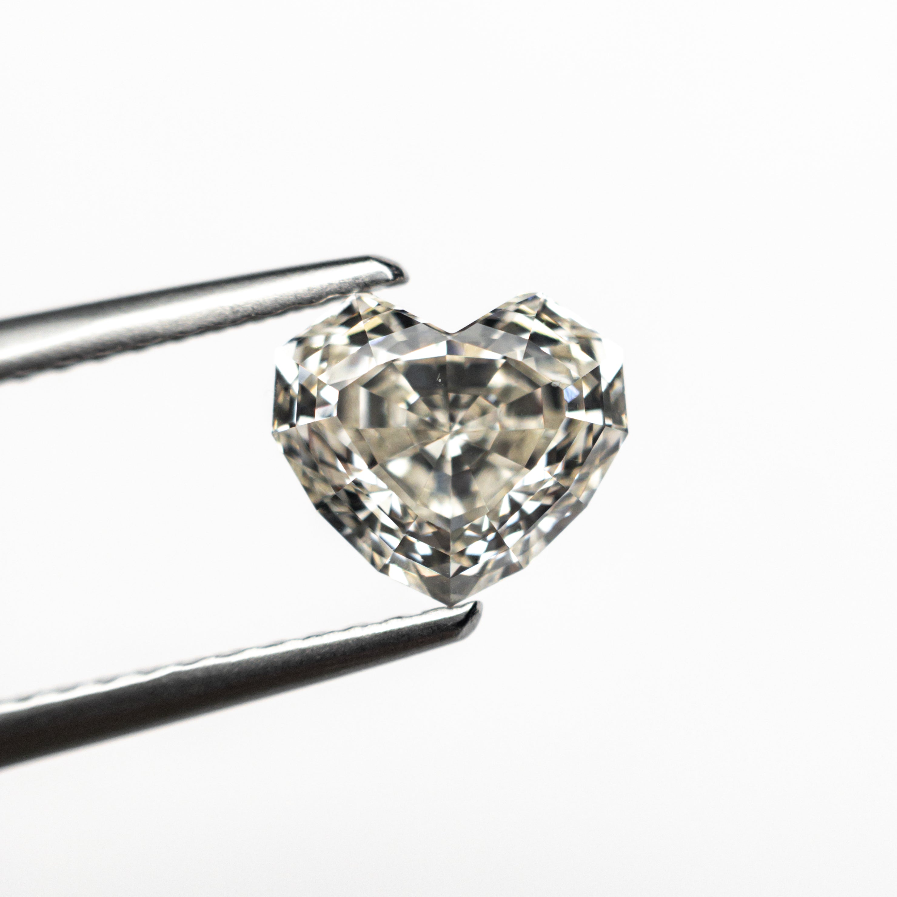 1.43ct 6.43x7.28x4.43mm GIA VS2 M Geo Heart Step Cut 26314-01