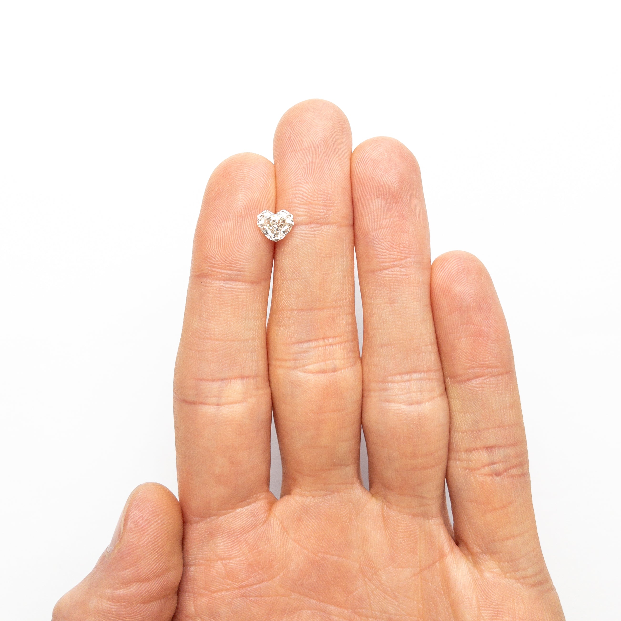 1.43ct 6.43x7.28x4.43mm GIA VS2 M Geo Heart Step Cut 26314-01