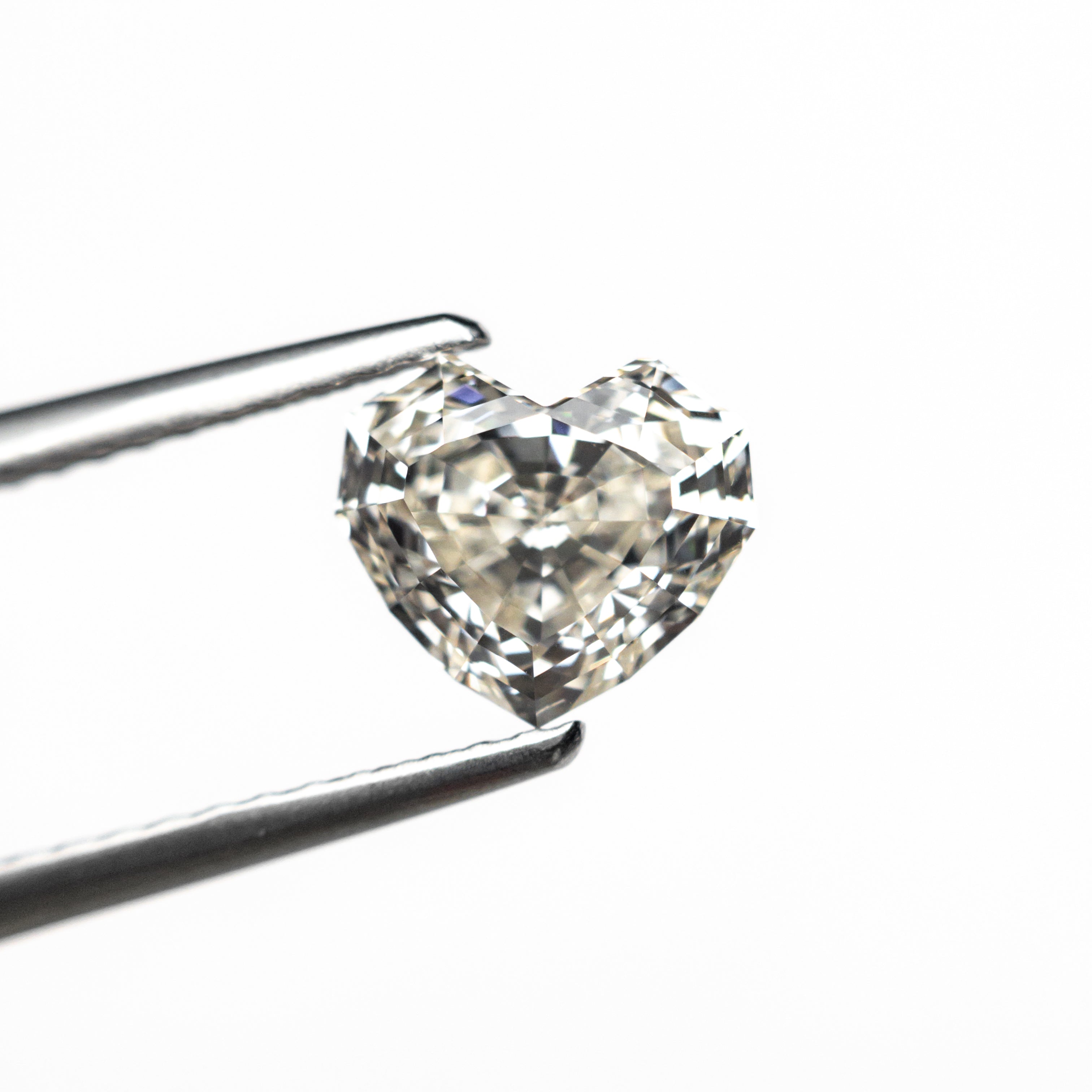 1.41ct 6.44x7.32x4.42mm GIA VVS2 L Geo Heart Step Cut 26314-02