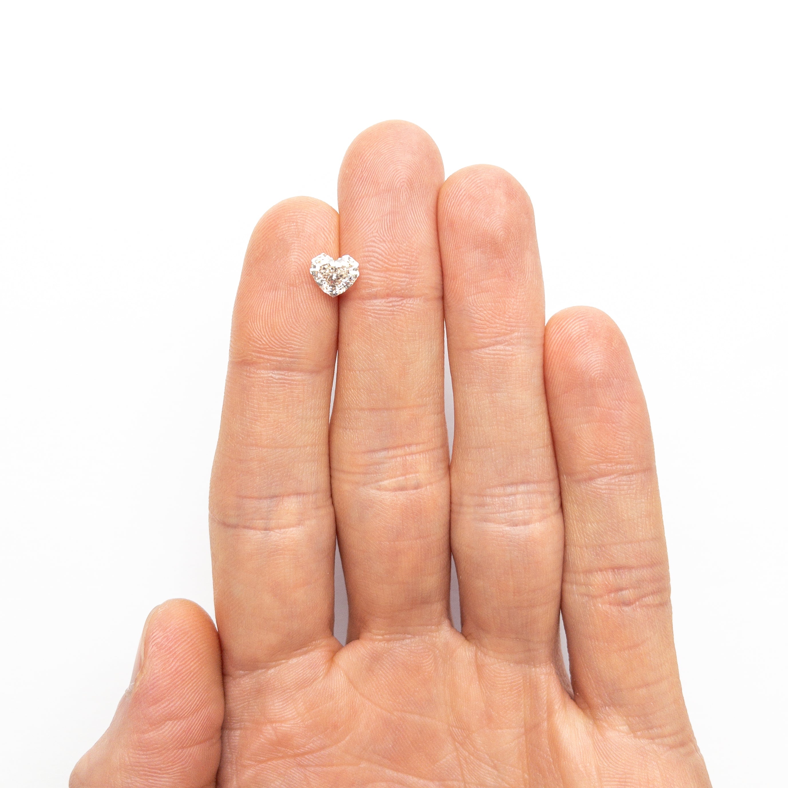 1.41ct 6.44x7.32x4.42mm GIA VVS2 L Geo Heart Step Cut 26314-02