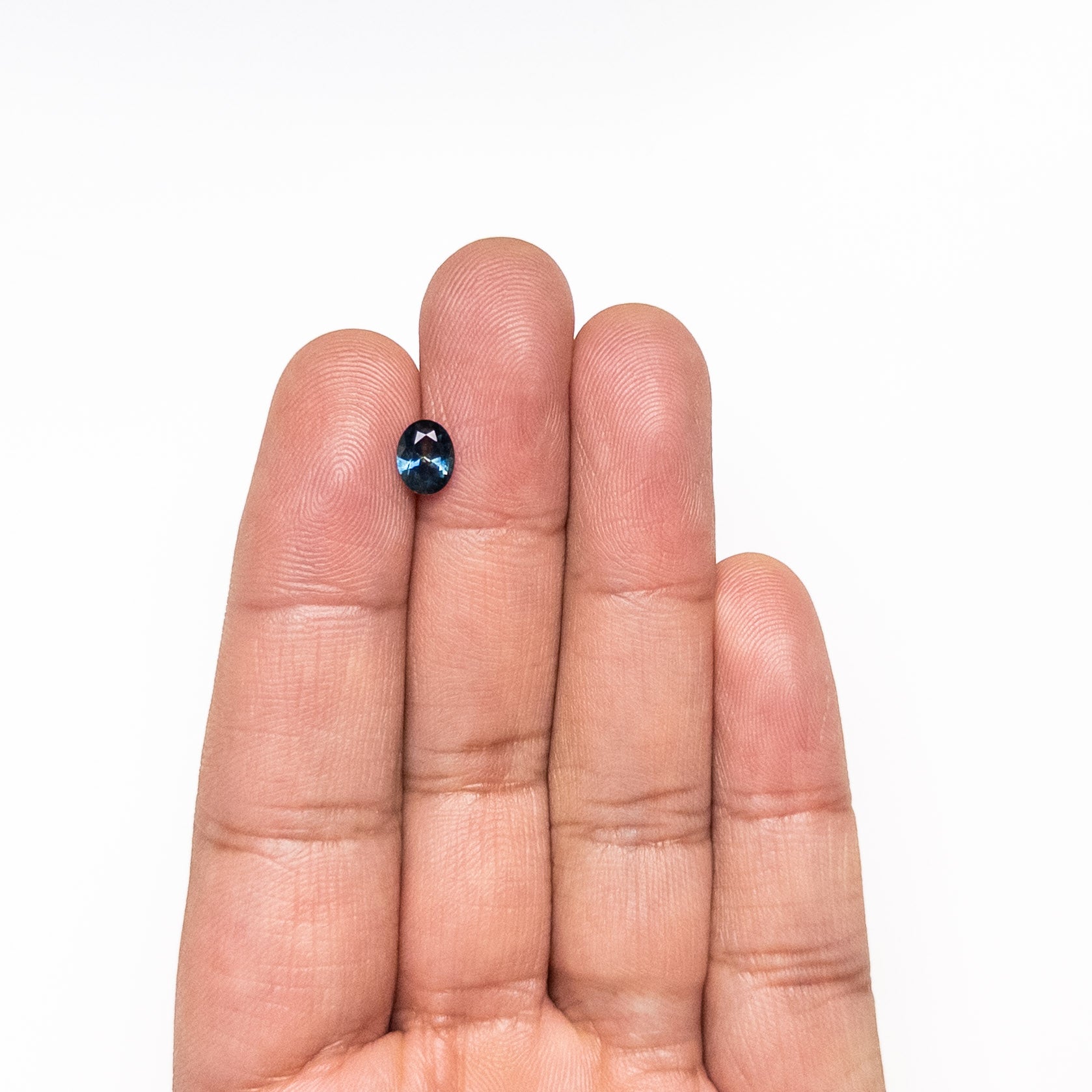 0.99ct 6.99x5.43x3.41mm Oval Brilliant Sapphire 26527-15