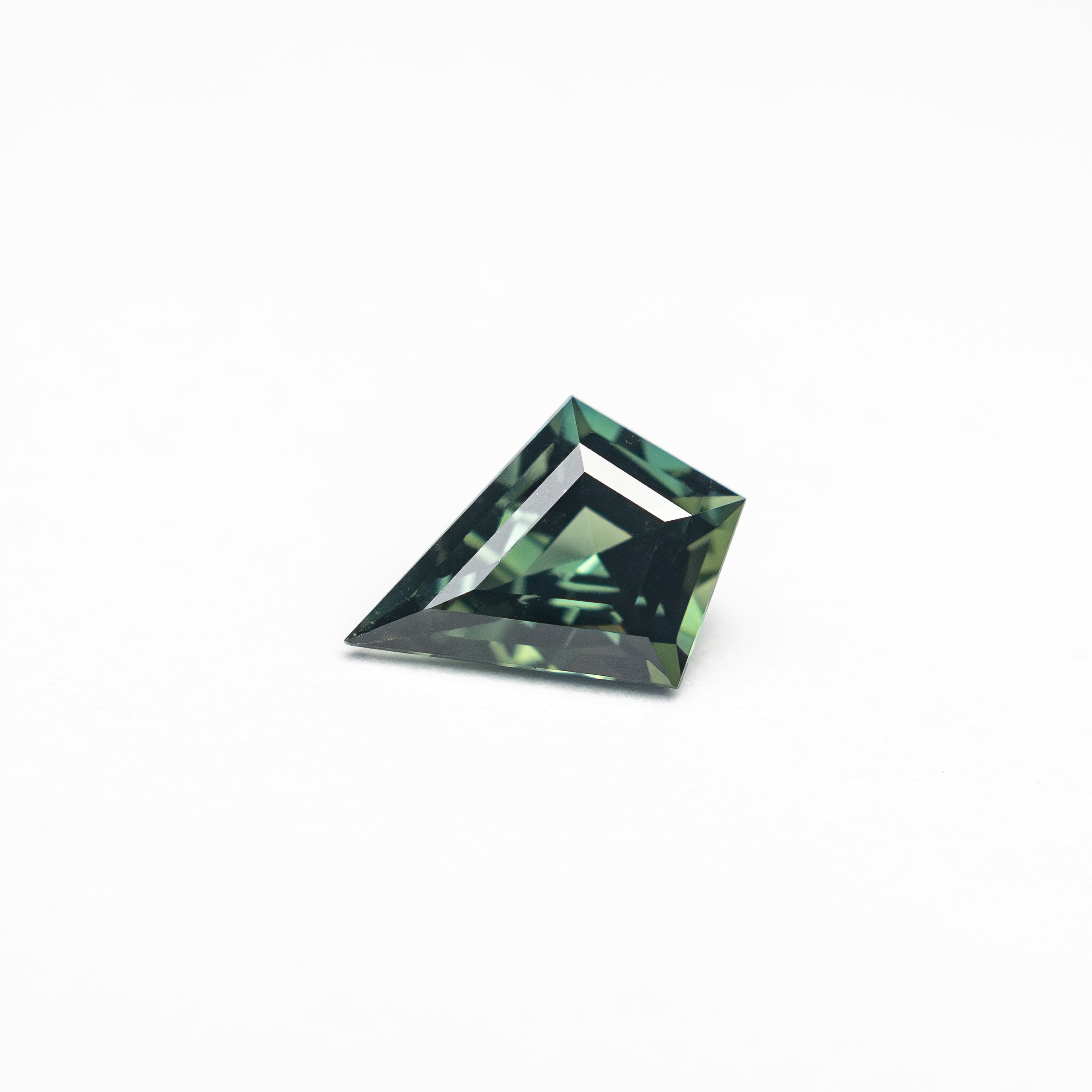 0.60ct 7.22x4.75x3.22mm Kite Step Cut Sapphire 27336-19