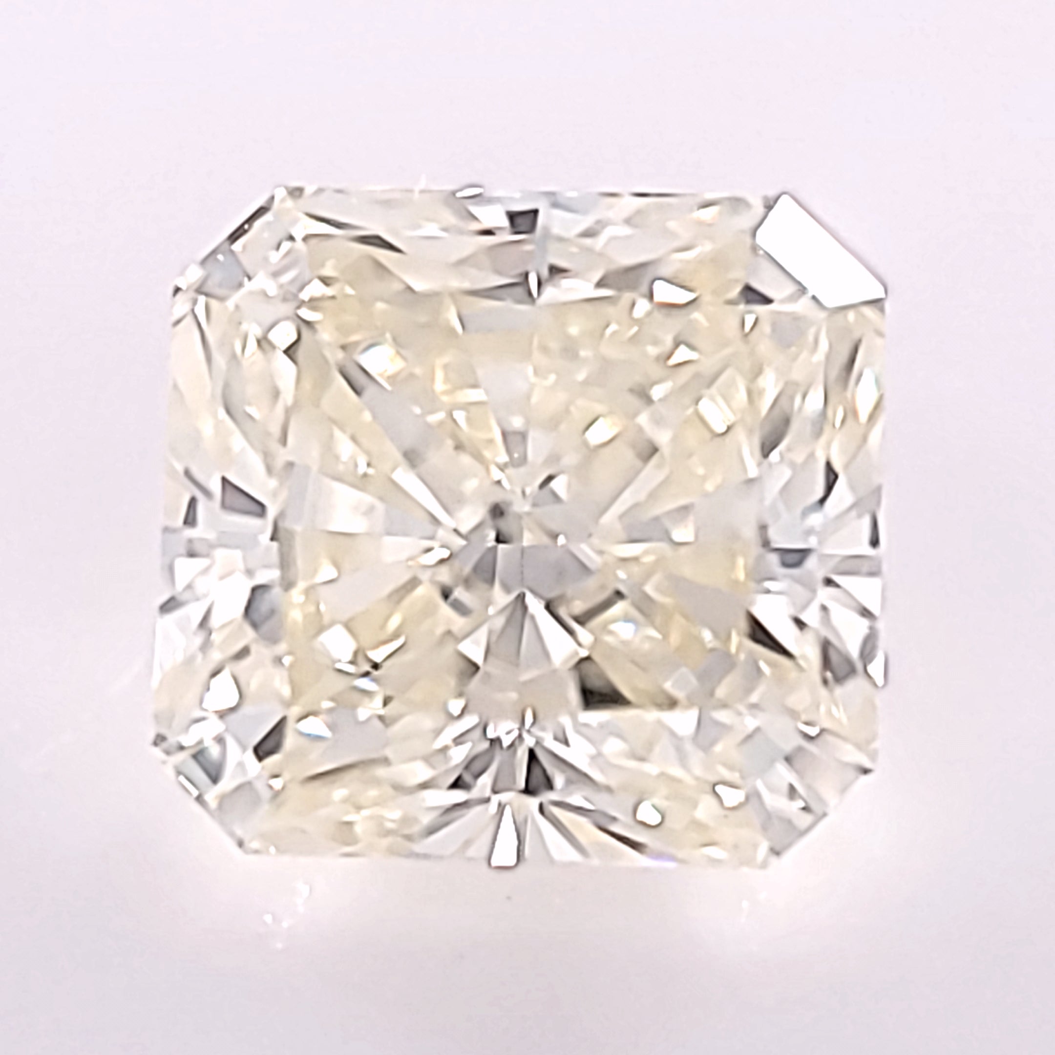 0.58ct RADIANT, FANCY LIGHT YELLOW SI1, EX EX FL Med Blue GIA #16780928