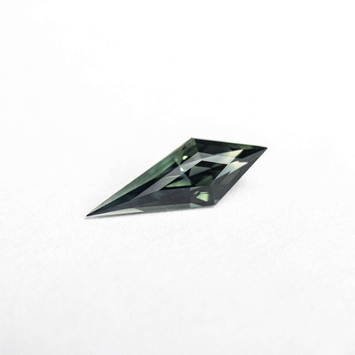 0.52ct 10.27x3.70x2.95mm Kite Step Cut Sapphire 25196-05