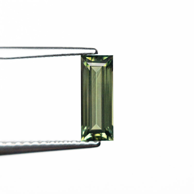 0.85ct 8.45x3.22x2.61mm Rectangle Step Cut Sapphire 25740-03