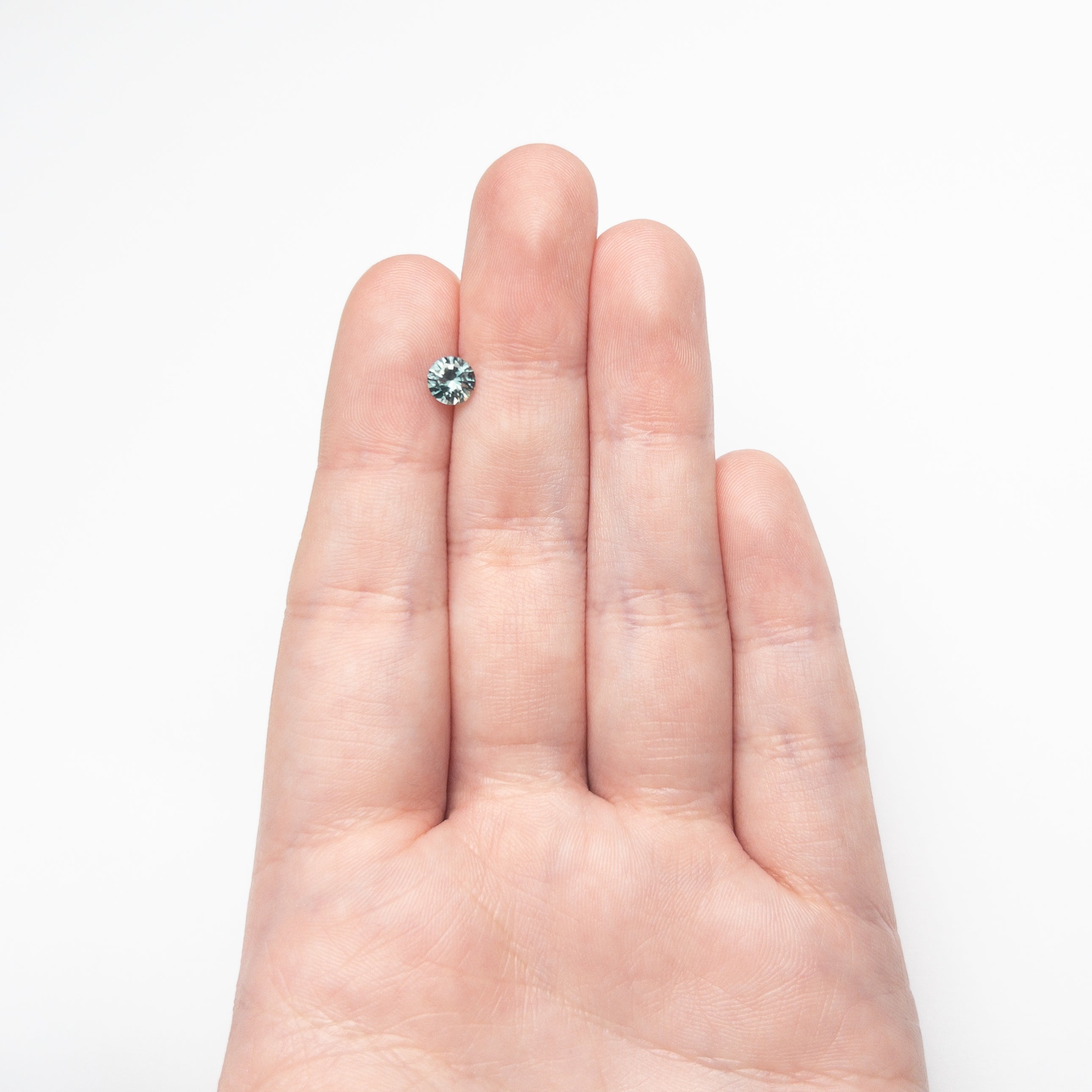 0.81ct 5.54x5.51x3.56mm Round Brilliant Sapphire 26134-24