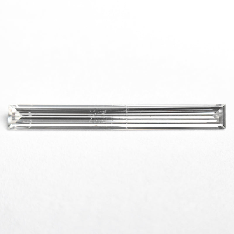 0.52ct 19.44x2.17x1.09mm SI2 E Baguette Step Cut 26545-01