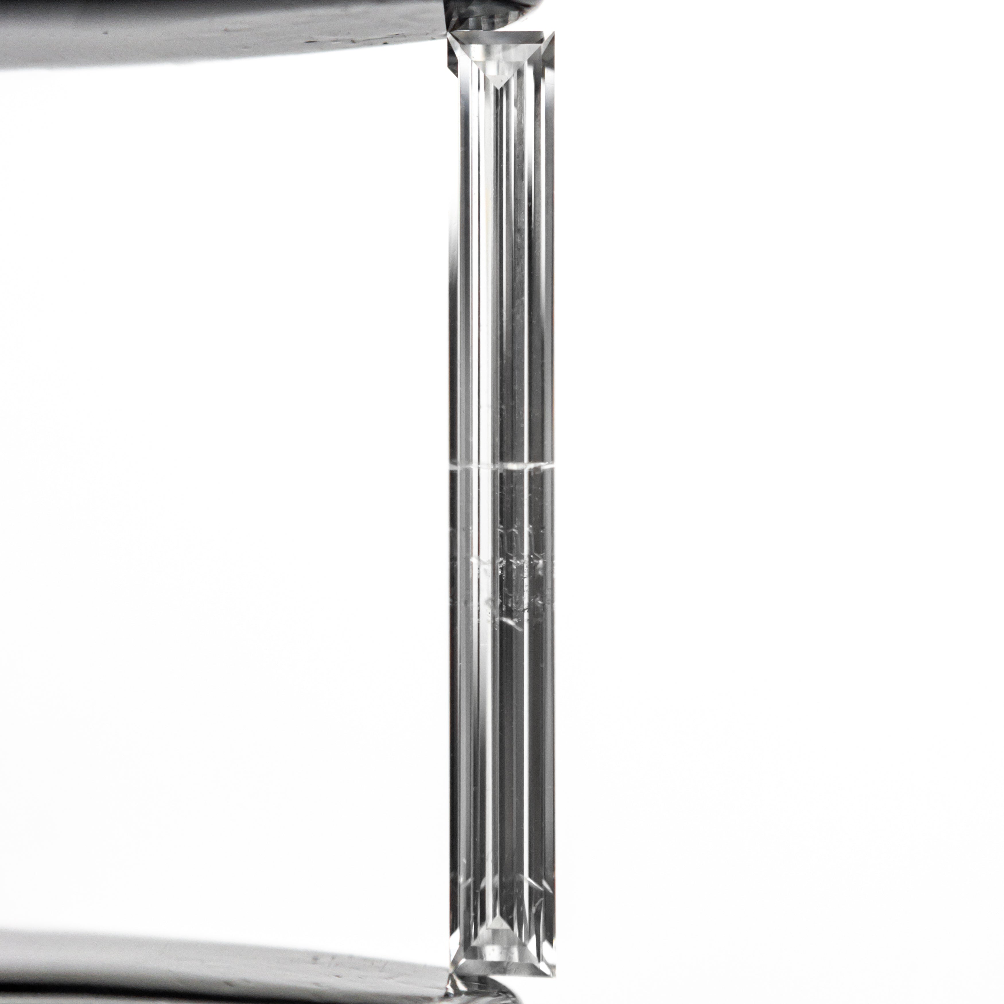 0.52ct 19.44x2.17x1.09mm SI2 E Baguette Step Cut 26545-01