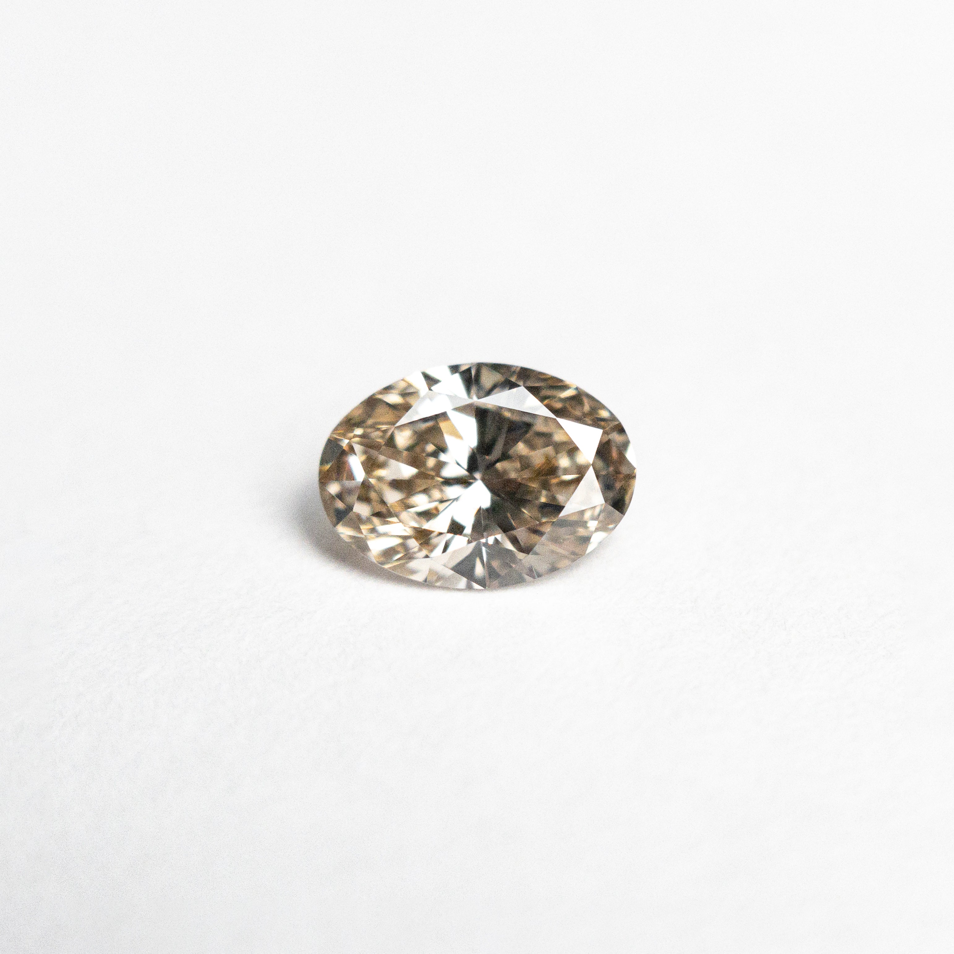 0.53ct 6.41x4.60x2.78mm VS1 C3 Oval Brilliant 26605-02