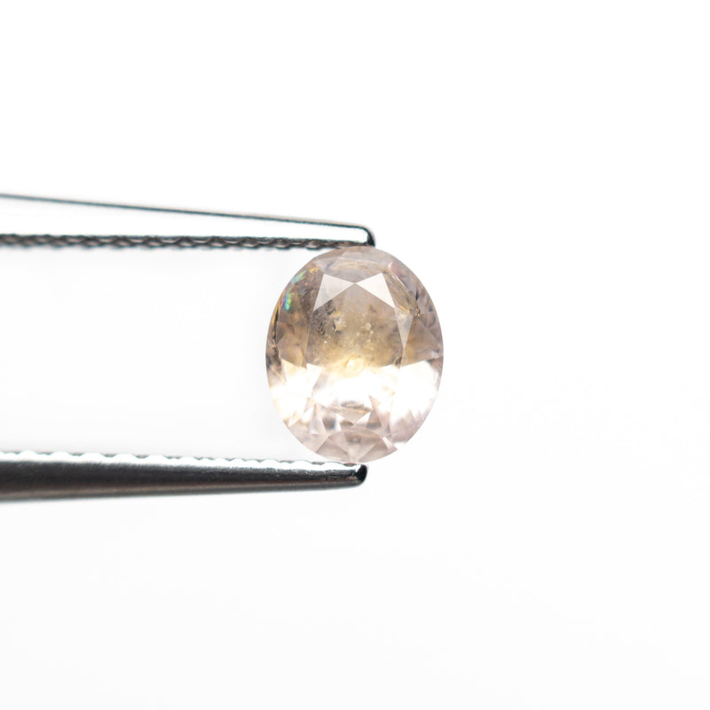 0.60ct 5.78x4.71x2.98mm Oval Brilliant Sapphire 26668-09