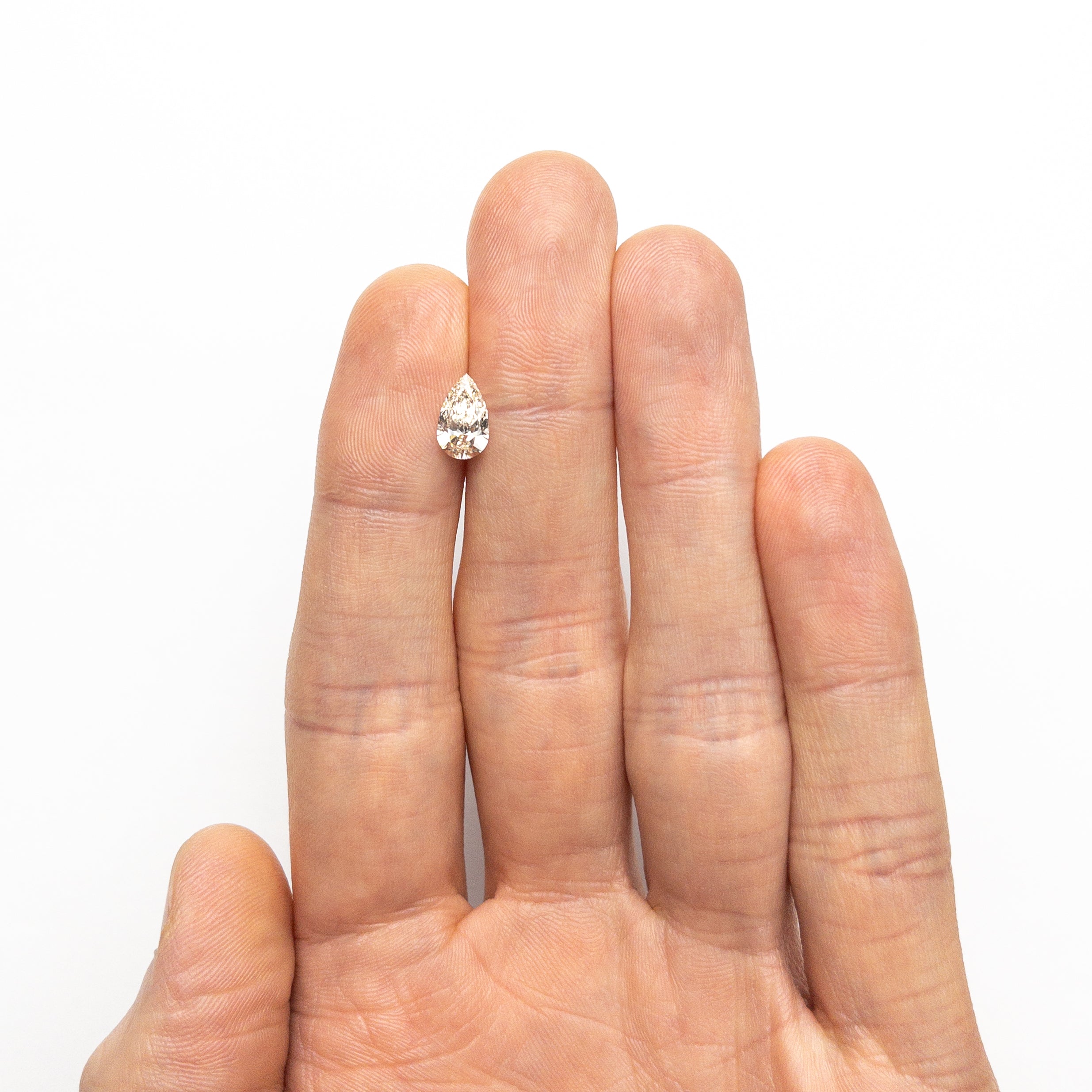 1.01ct 9.23x5.54x3.27mm VS1 M Pear Brilliant 27081-10