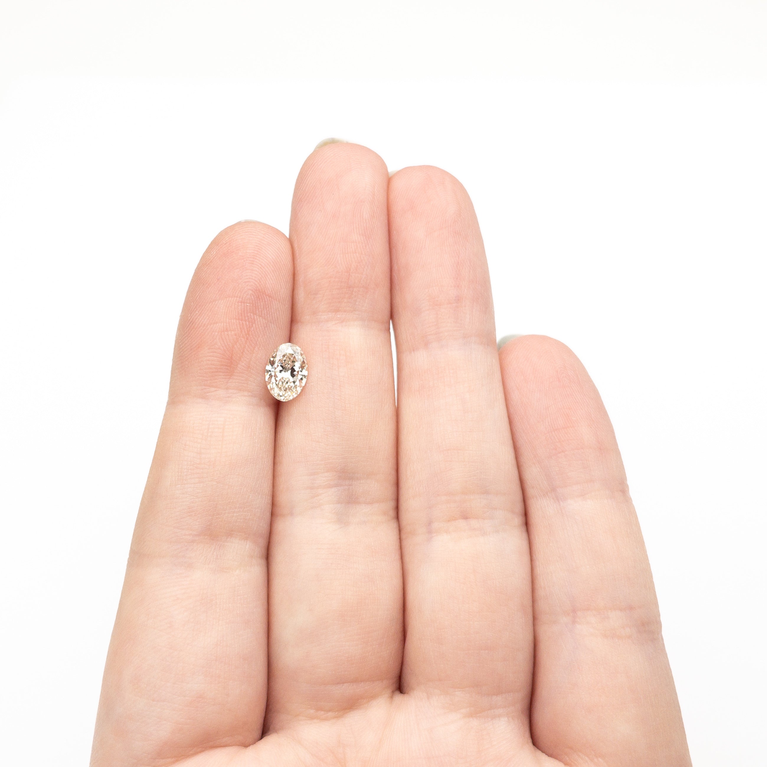 0.99ct 7.76x5.53x3.45mm SI1 N Oval Brilliant 27376-11