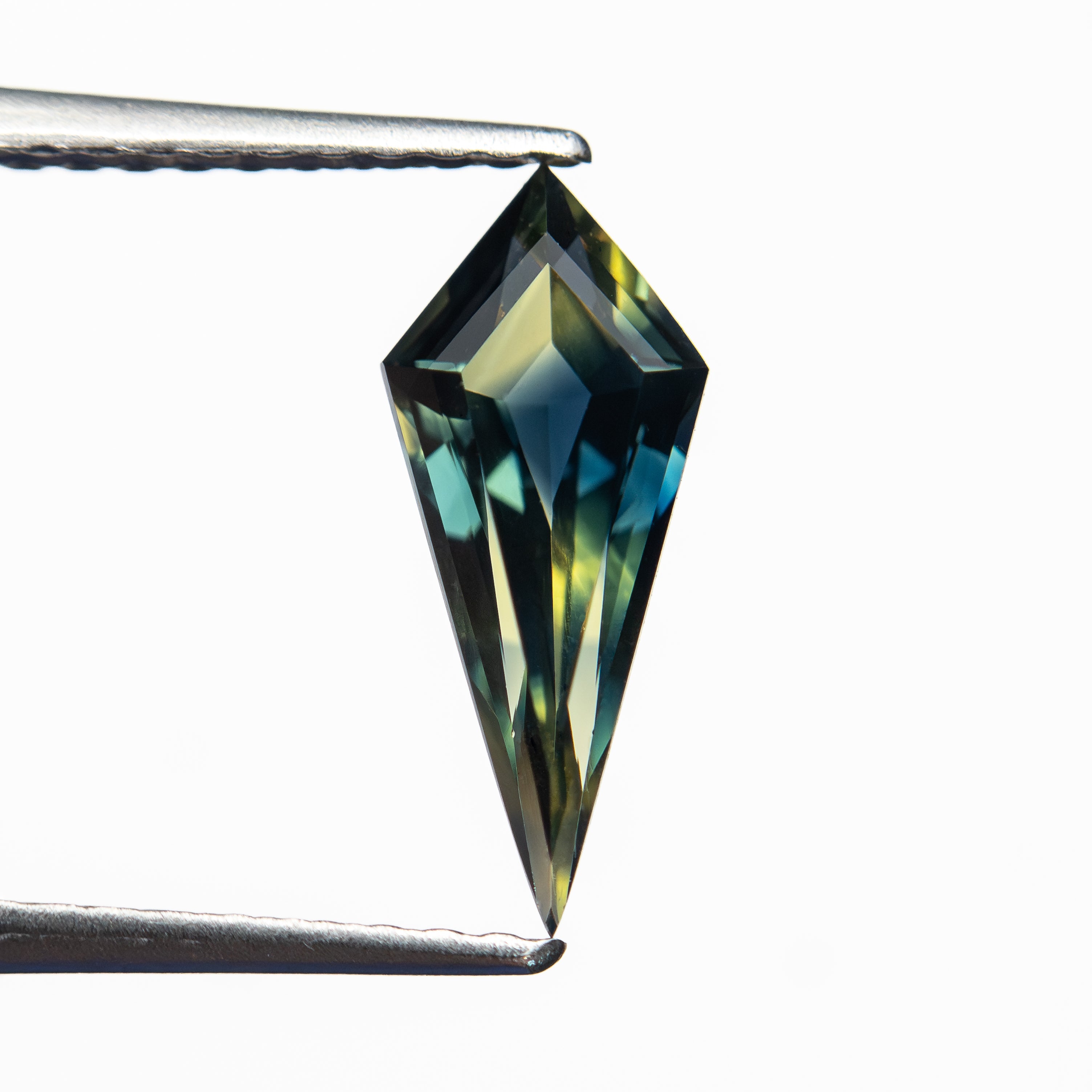 0.99ct 11.62x4.92x3.08mm Kite Step Cut Sapphire 27713-01