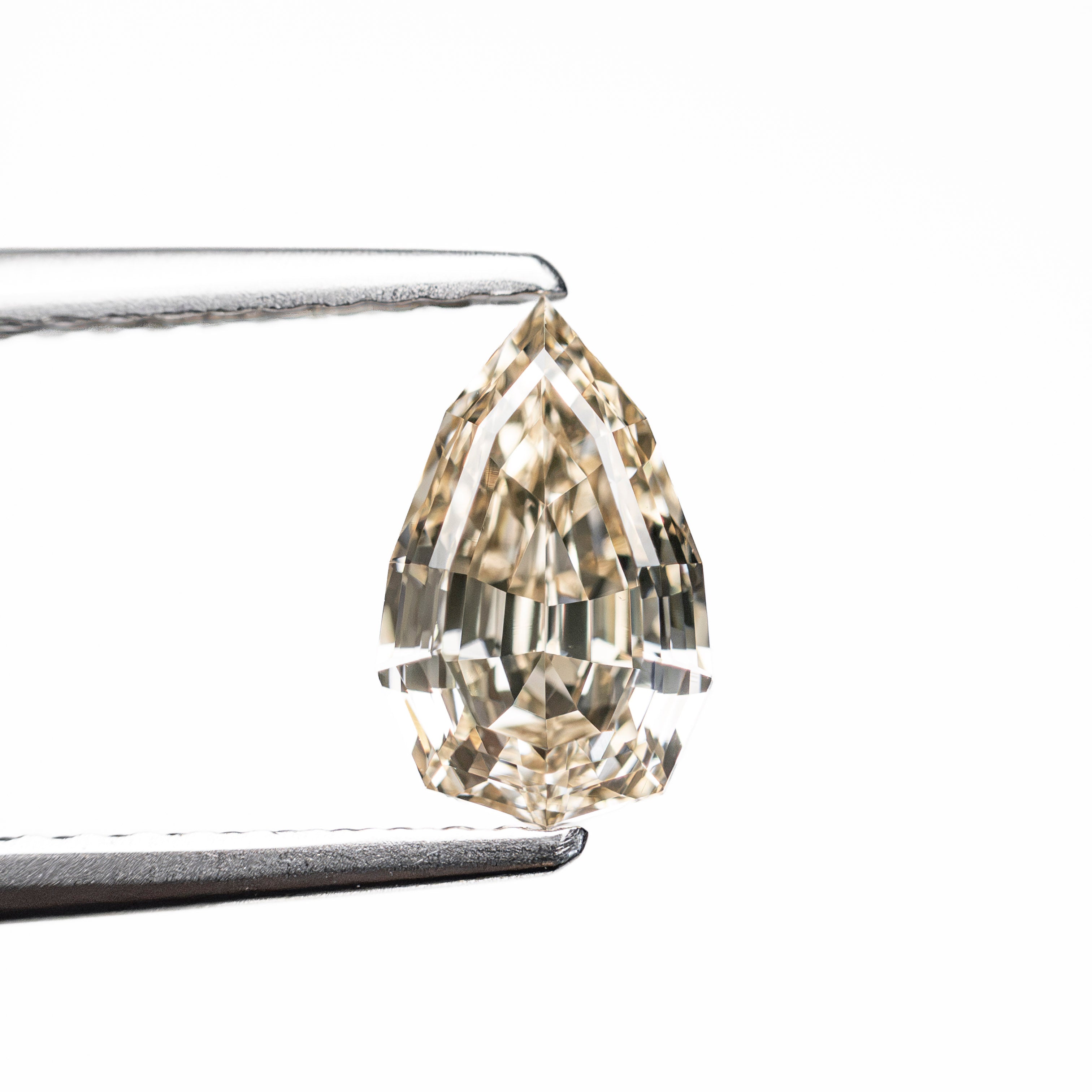 1.05ct 8.25x5.15x3.51mm VS2 Fancy Yellowish Brown Geo Pear Step Cut 28055-01